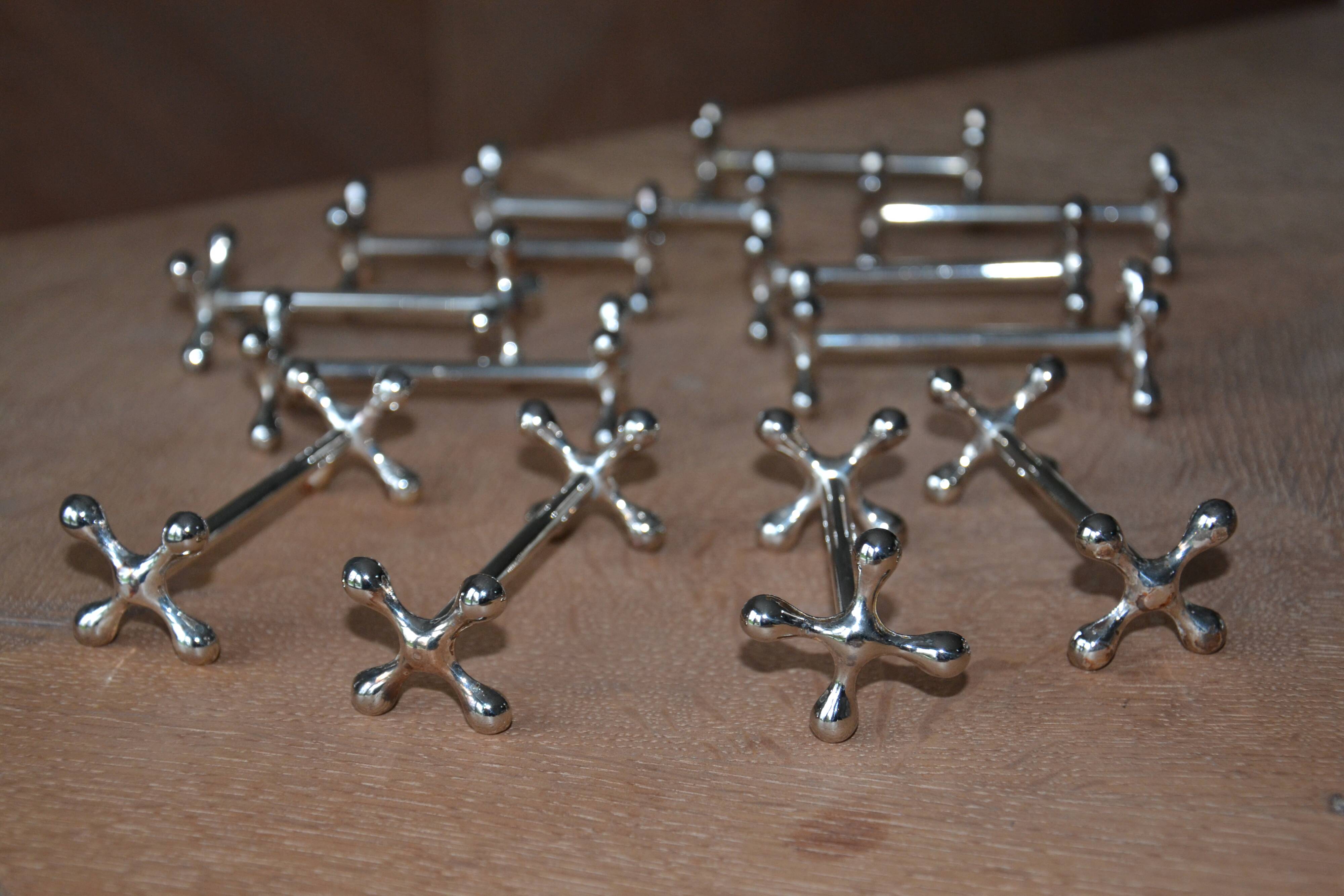 12 silver metal knife holders