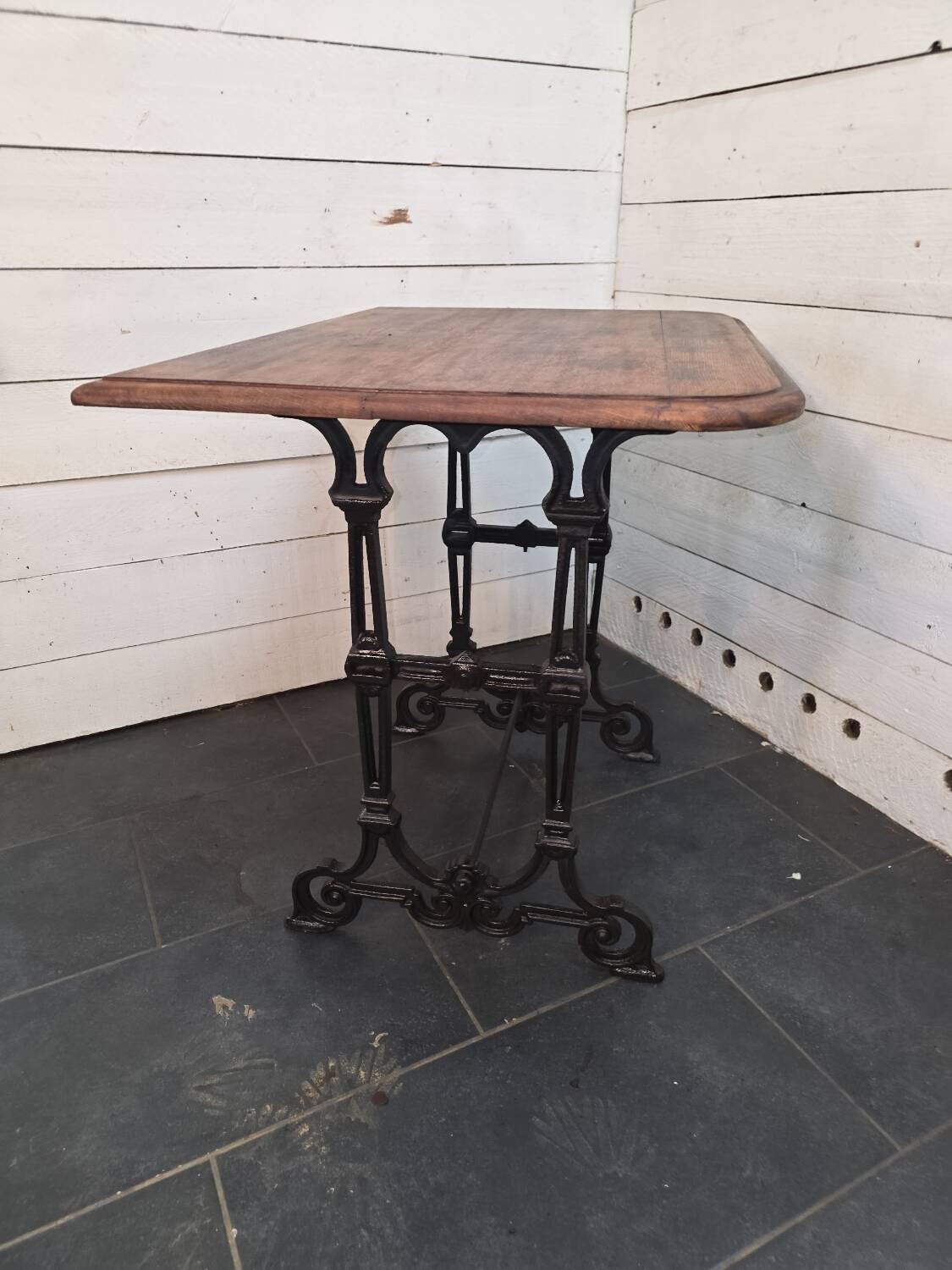 Bistro table with cast iron legs and oak top