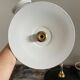 Pair of black enamelled sheet metal wall lamps electrified to nine
