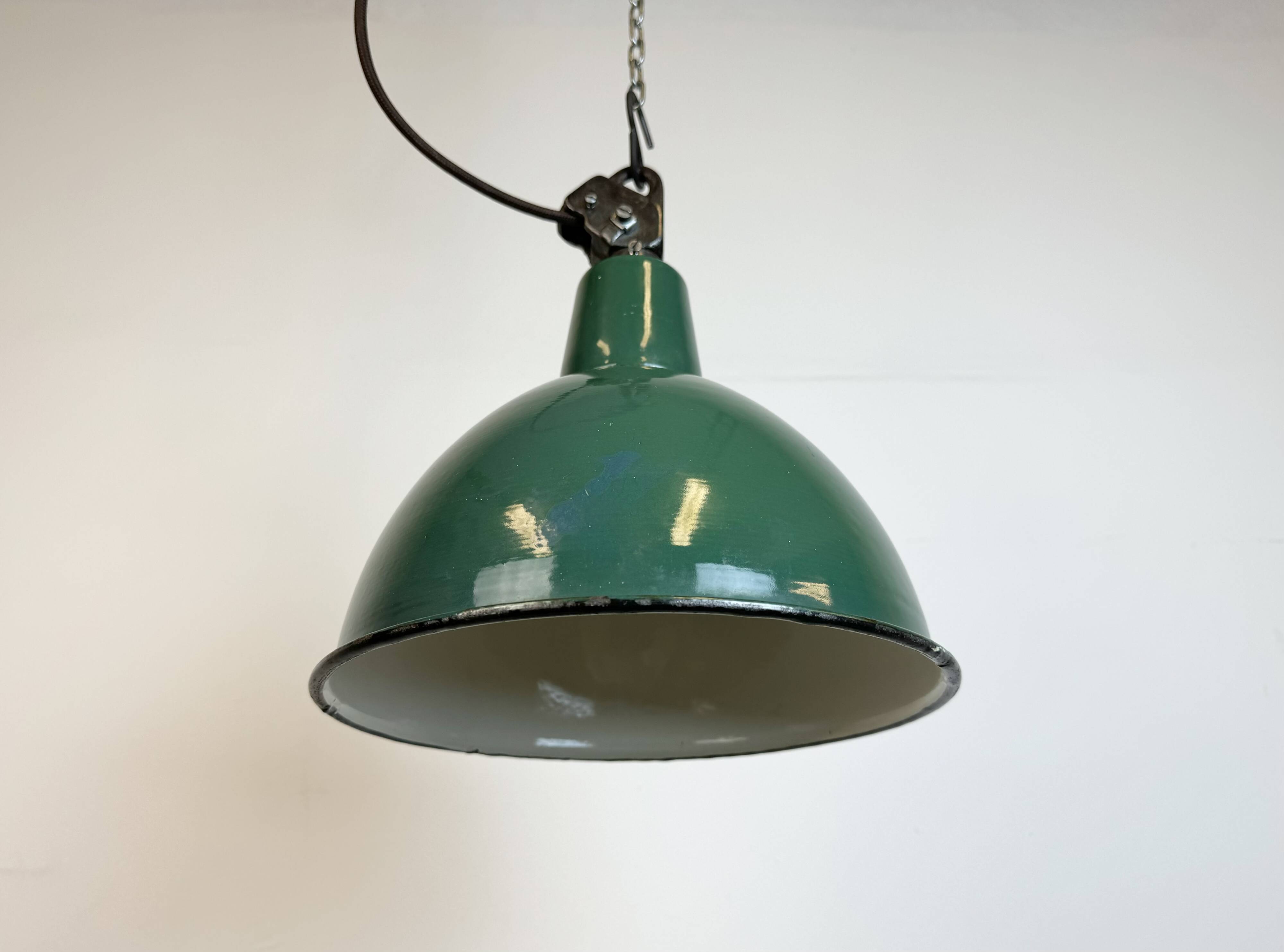 Industrial green enamel factory lamp with cast iron top, 1960s