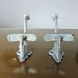 Pair of enameled cast iron coat hooks, 19th