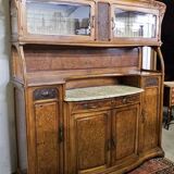 According to Gauthier-Poinsignon: large two-body buffet from the Art Nouveau period in walnut and burl.