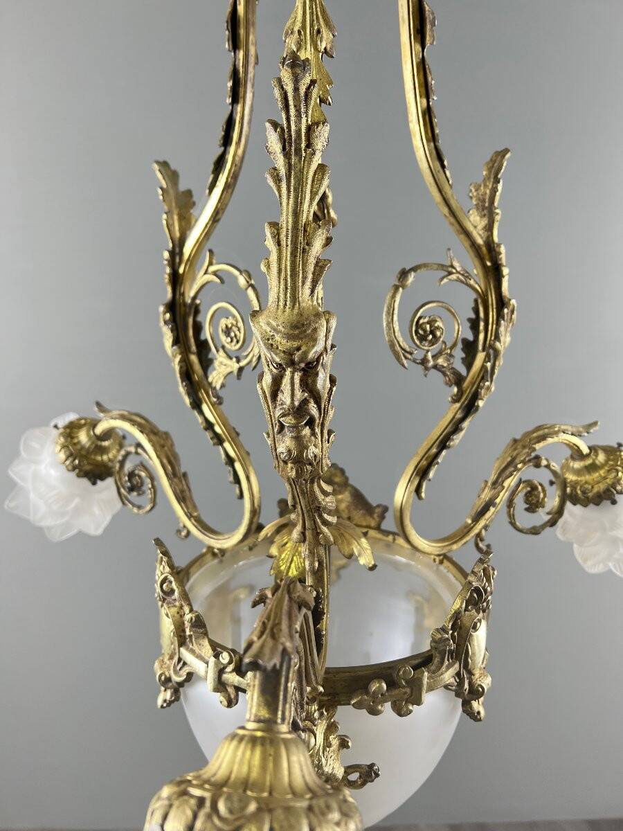 Louis XV style chandelier in bronze and glass, 19th century
