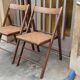 Pair of vintage wooden and cane folding chairs