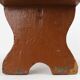 French rustic low church stool in terracotta painted wood, ca. 1900