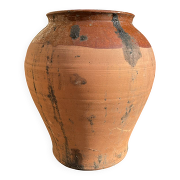 Ancient terracotta pottery jar