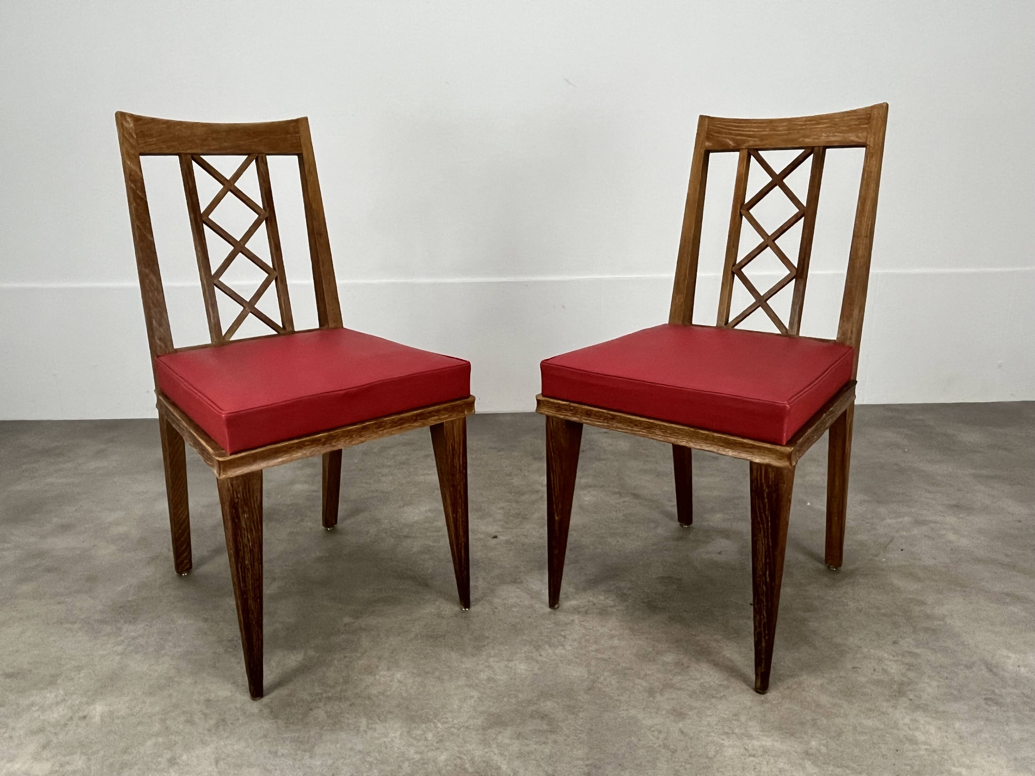 Pair of 1950s wooden cross-braced chairs