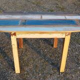 Oval table in polychrome wood