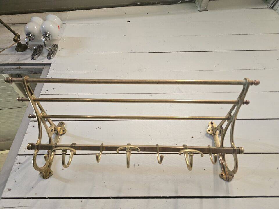 Wall-mounted coat rack with brass hat rack