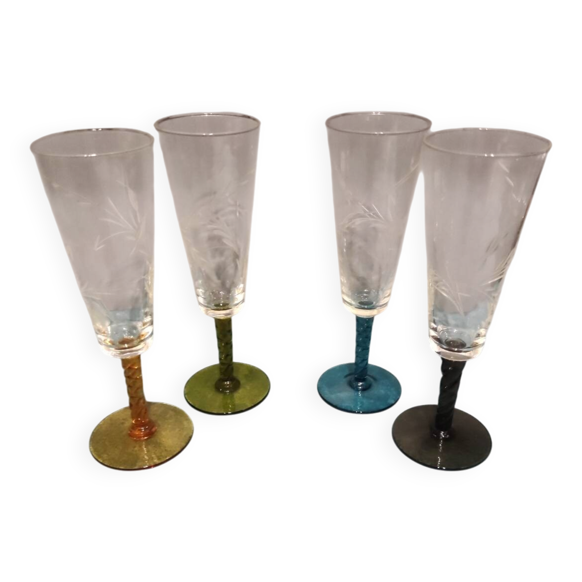 Four vintage stemmed glasses