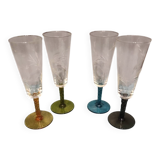 Four vintage stemmed glasses