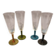 Four vintage stemmed glasses
