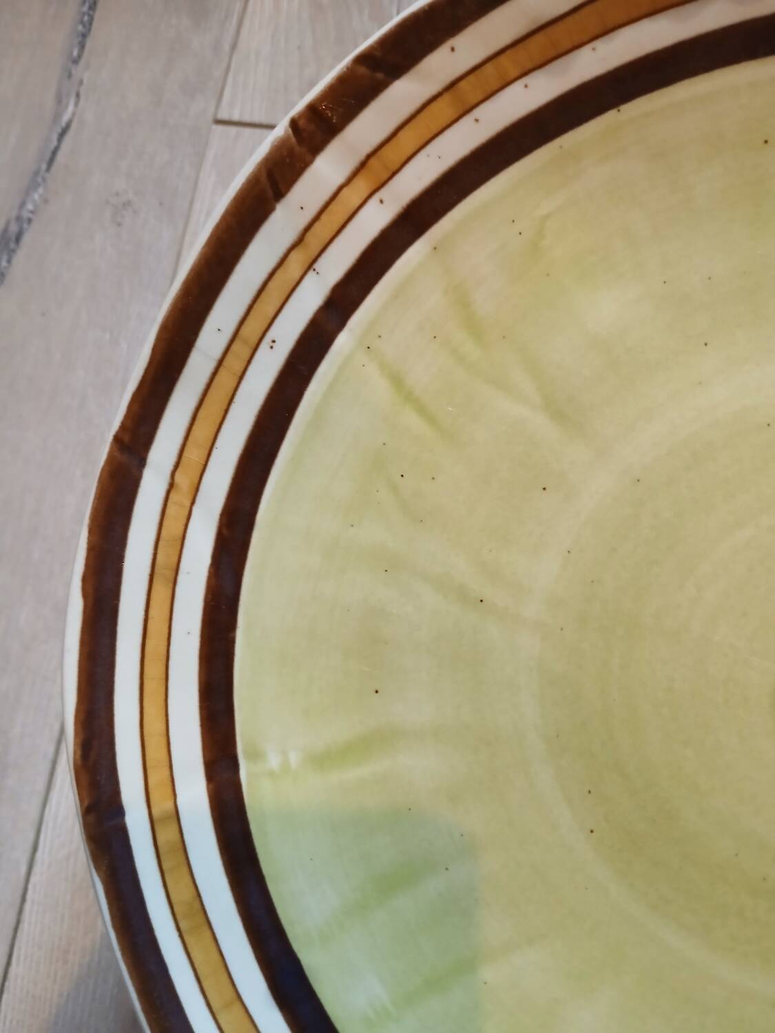 7 old stoneware flat plates