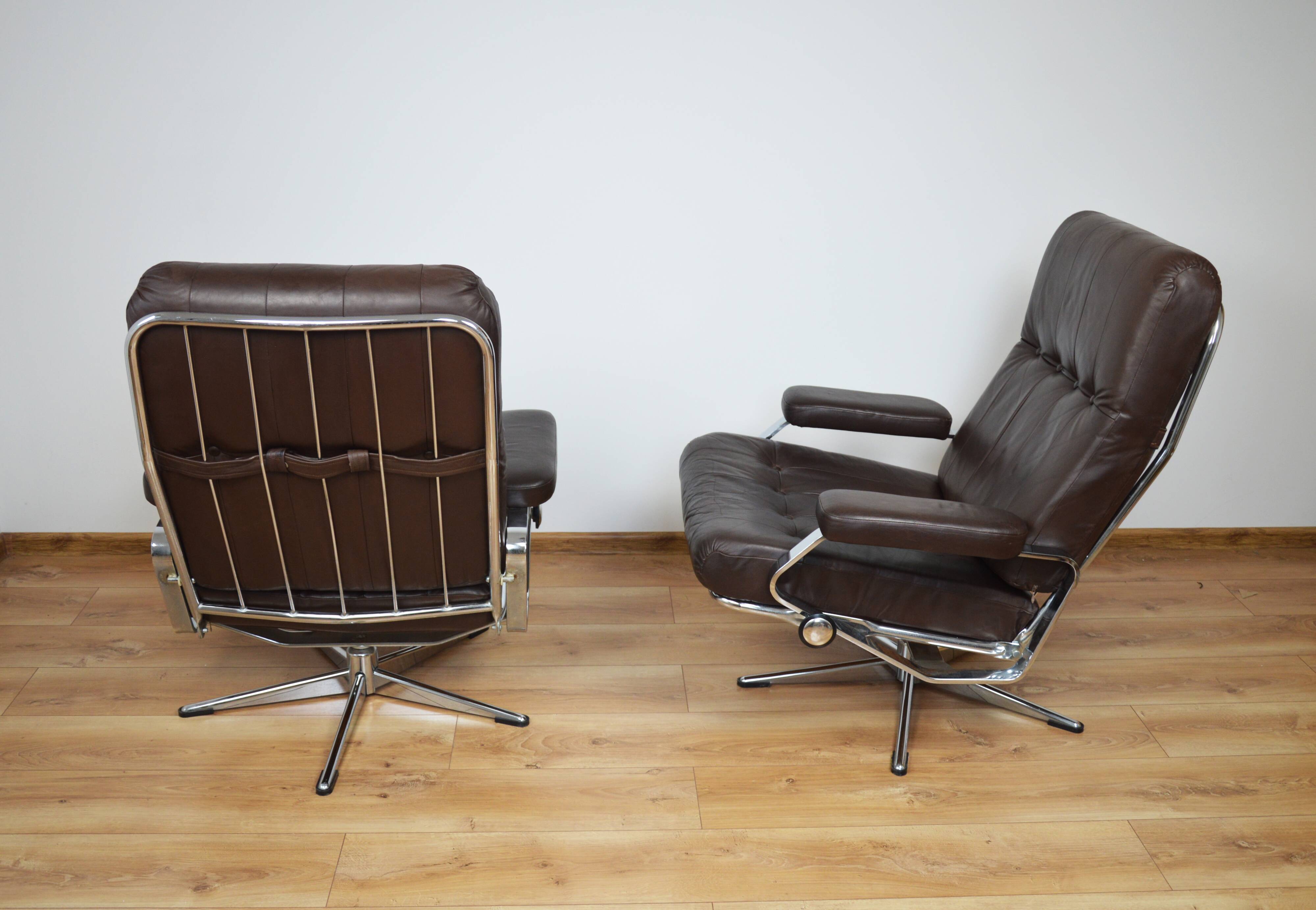 A pair of leather armchairs, 1970s