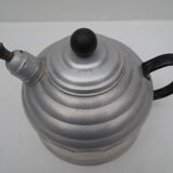 old aluminum kettle with a sufffloating system