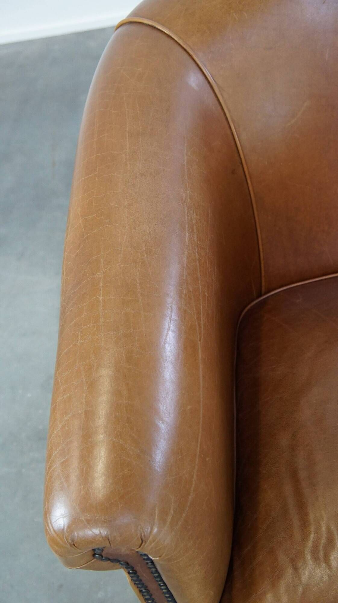 Set of 2 very comfortable light cognac-colored leather club armchairs in English style