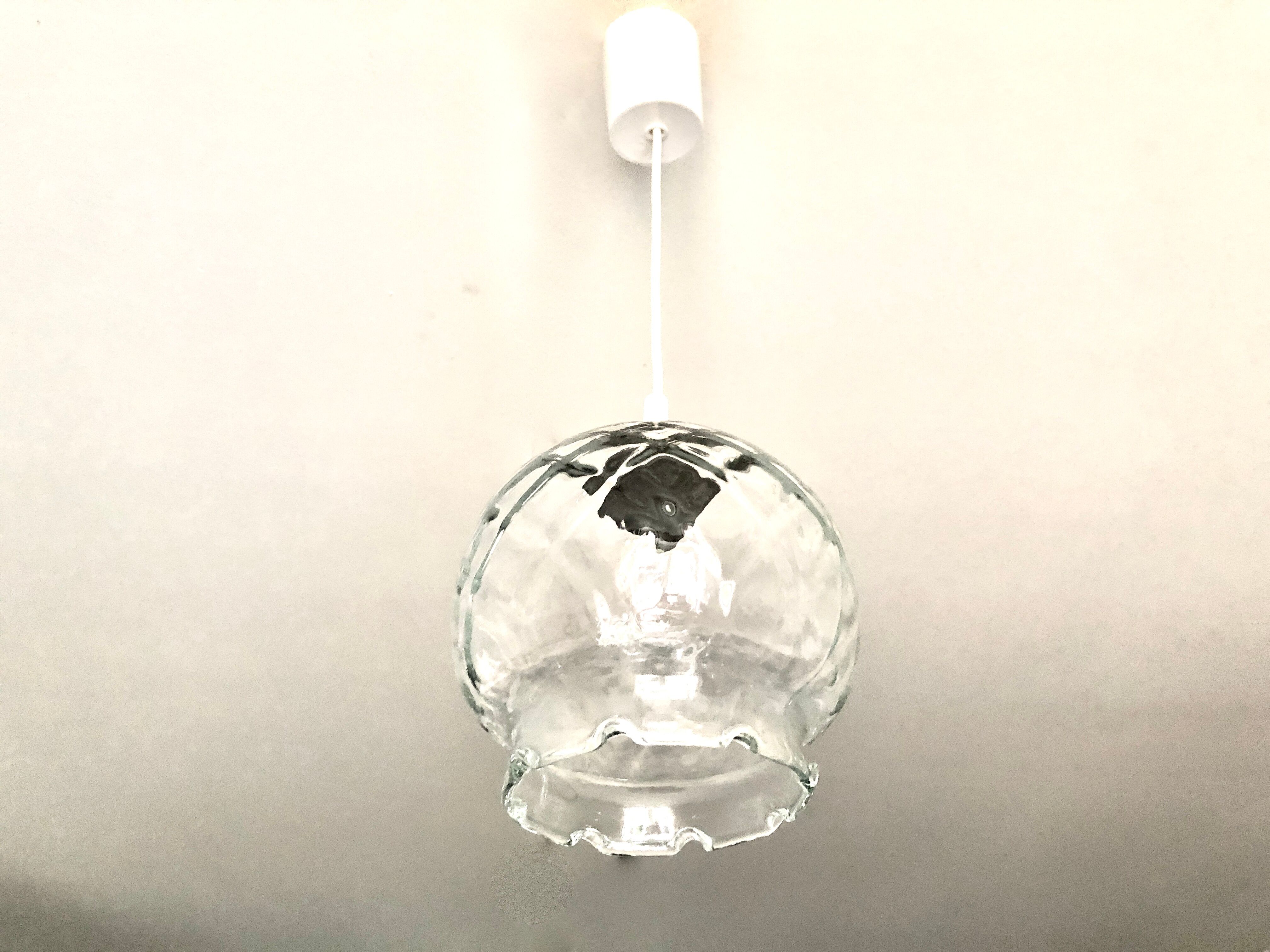 Suspension with transparent checkered glass steering wheels