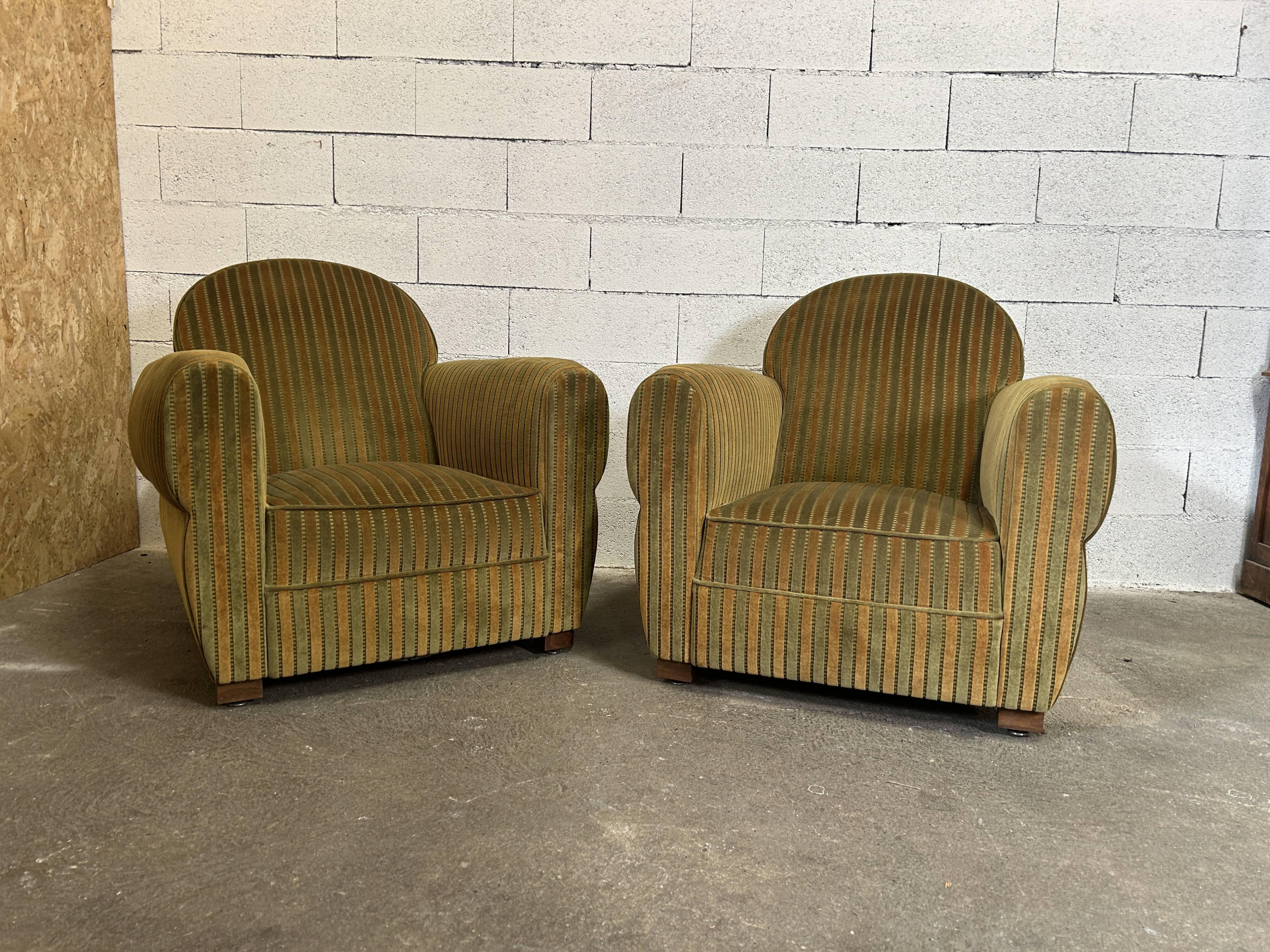 Pair of green fabric armchairs