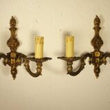 Pair of two-light wall lights in gilded bronze