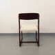 Vintage sled chair by Baumann in wood and boucle fabric.