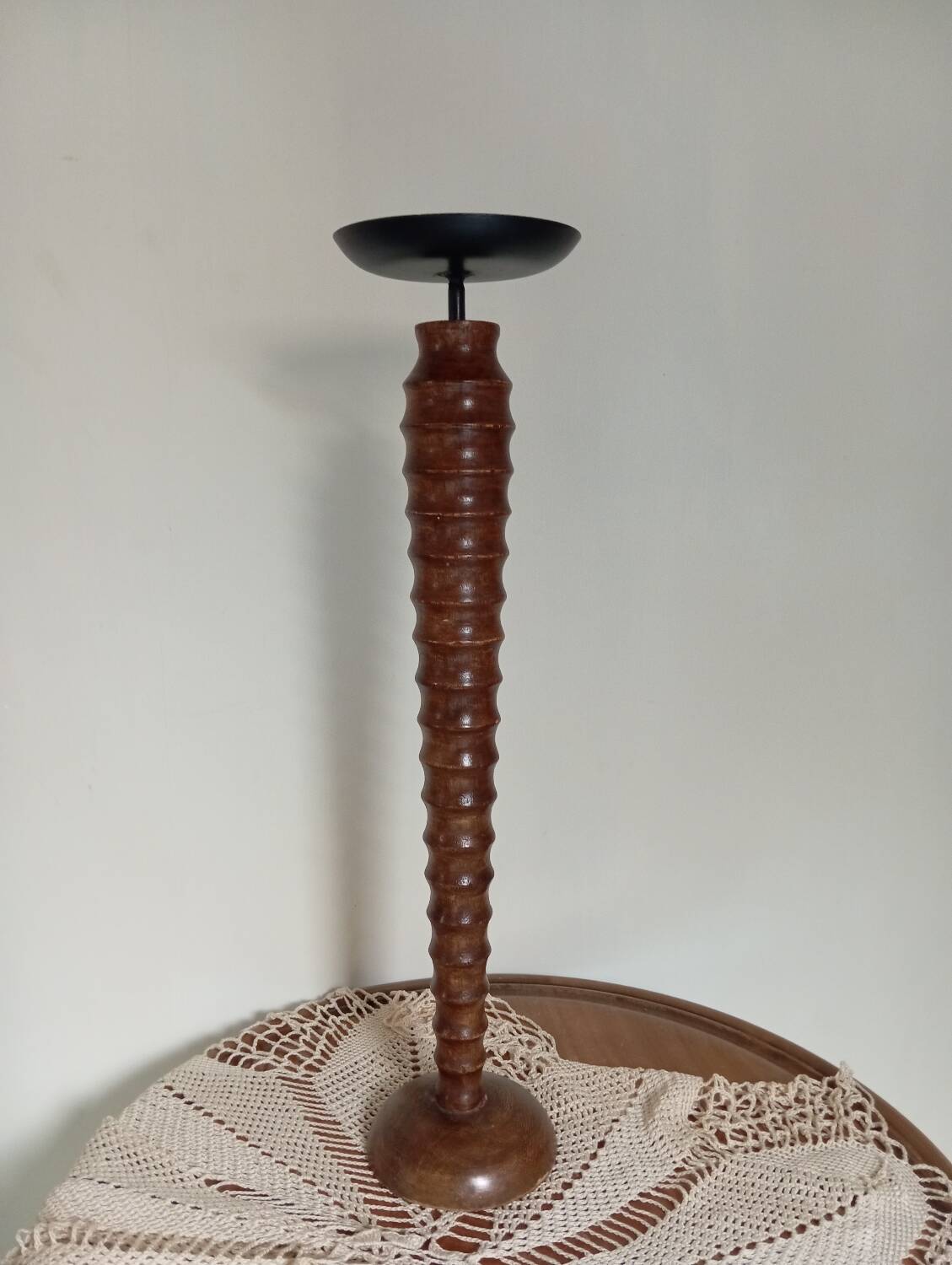 Vintage turned wooden candle holder, black metal candle base