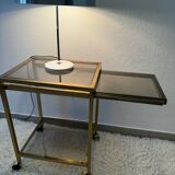 Brass rolling trolley with smoked glass from the 70s