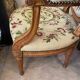 Louis XVI style medallion armchair with floral needlepoint tapestry
