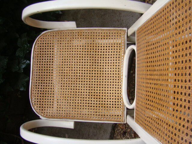 Antique caned rocking chair