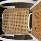 Antique caned rocking chair