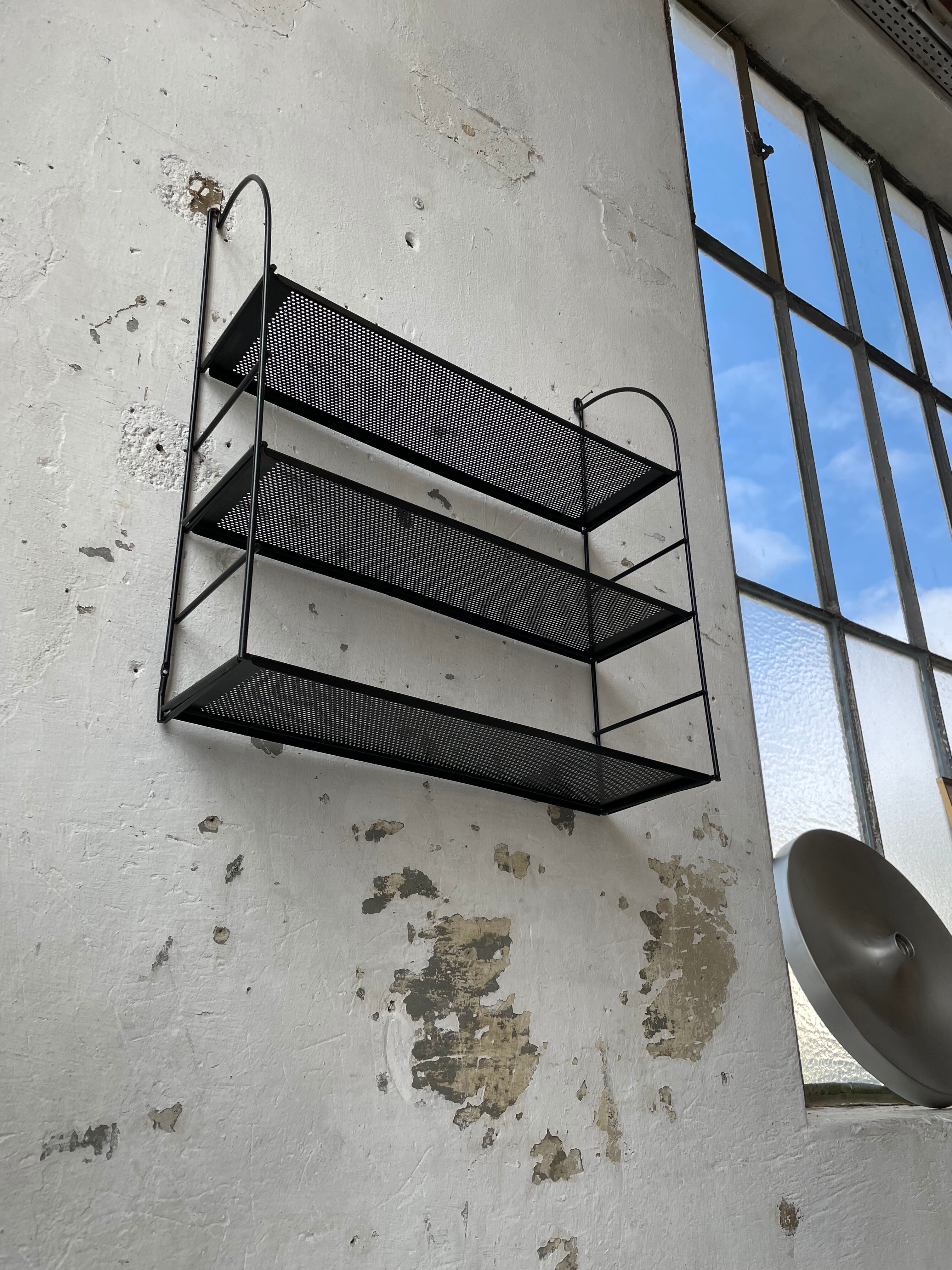 Black metal string shelf