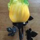 Art-deco style wall lamp with black metal support and foliage and glass paste tulip