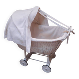 Wicker and painted wood baby cradle