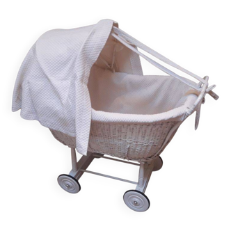 Wicker and painted wood baby cradle