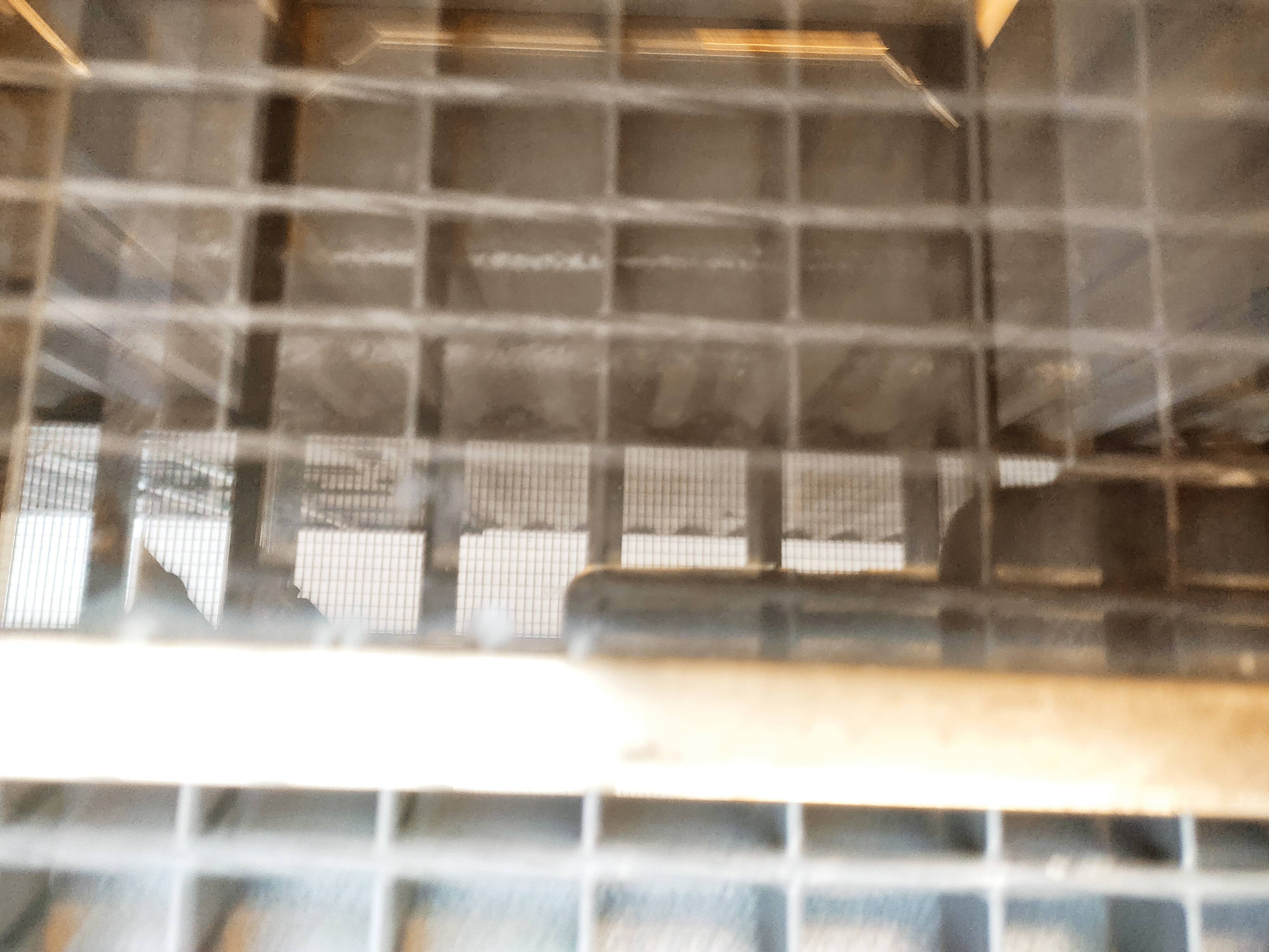 Sofa ends.in gilded metal and glass