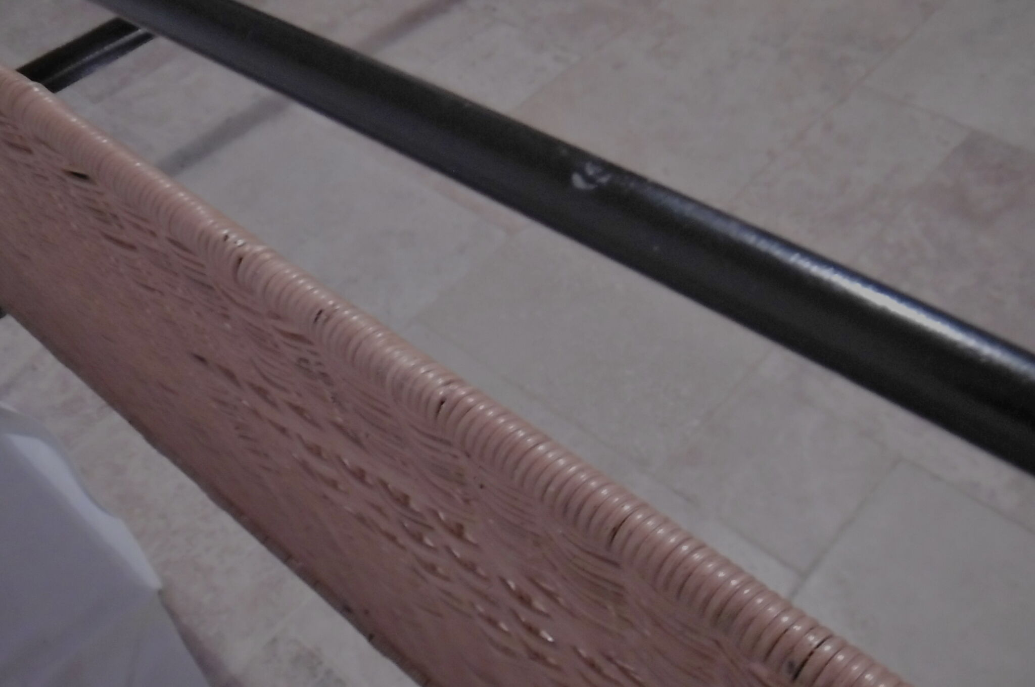 Black metal and rattan bed frame