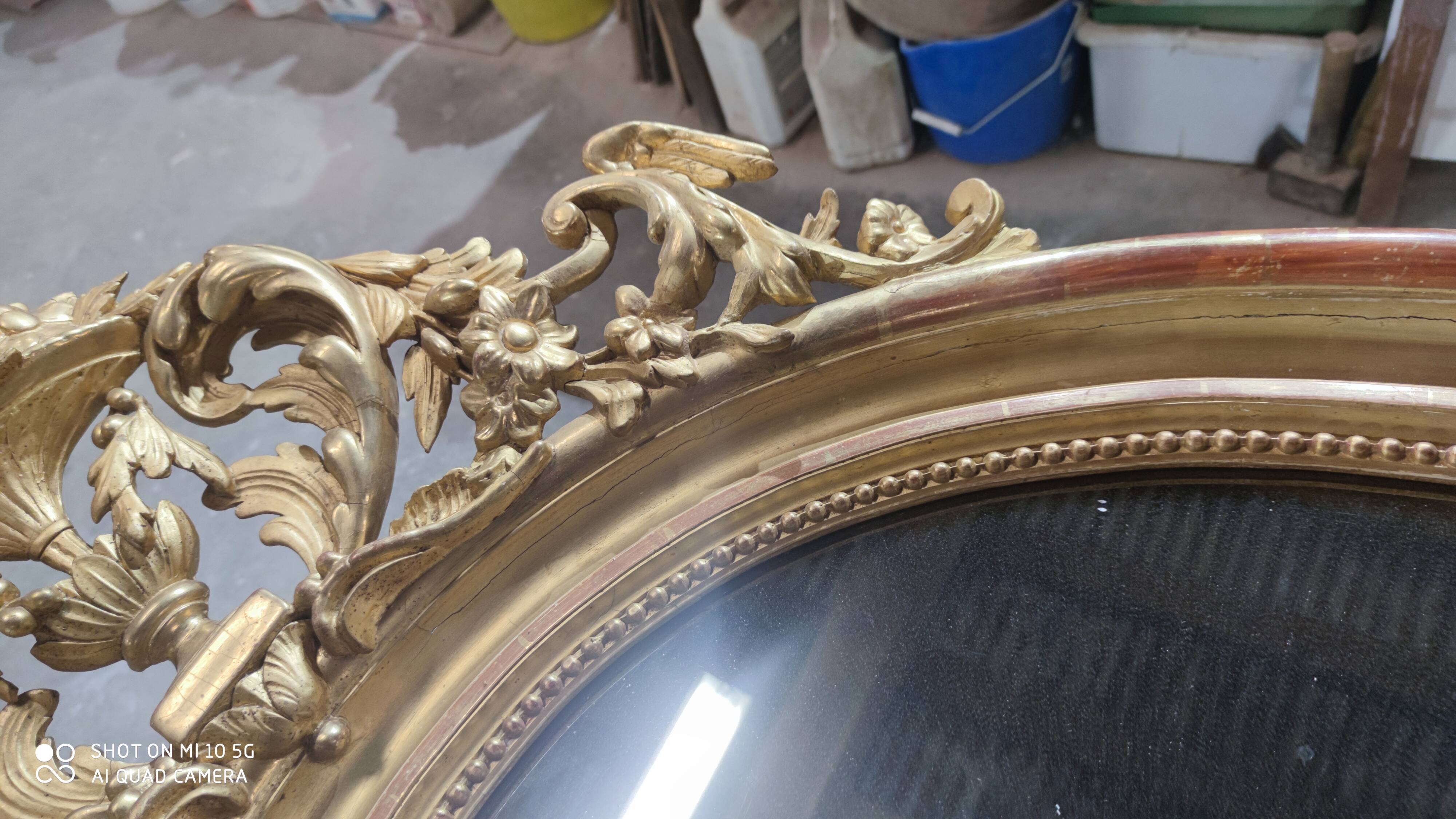 Mirror with a gilt medallion pediment, 1840