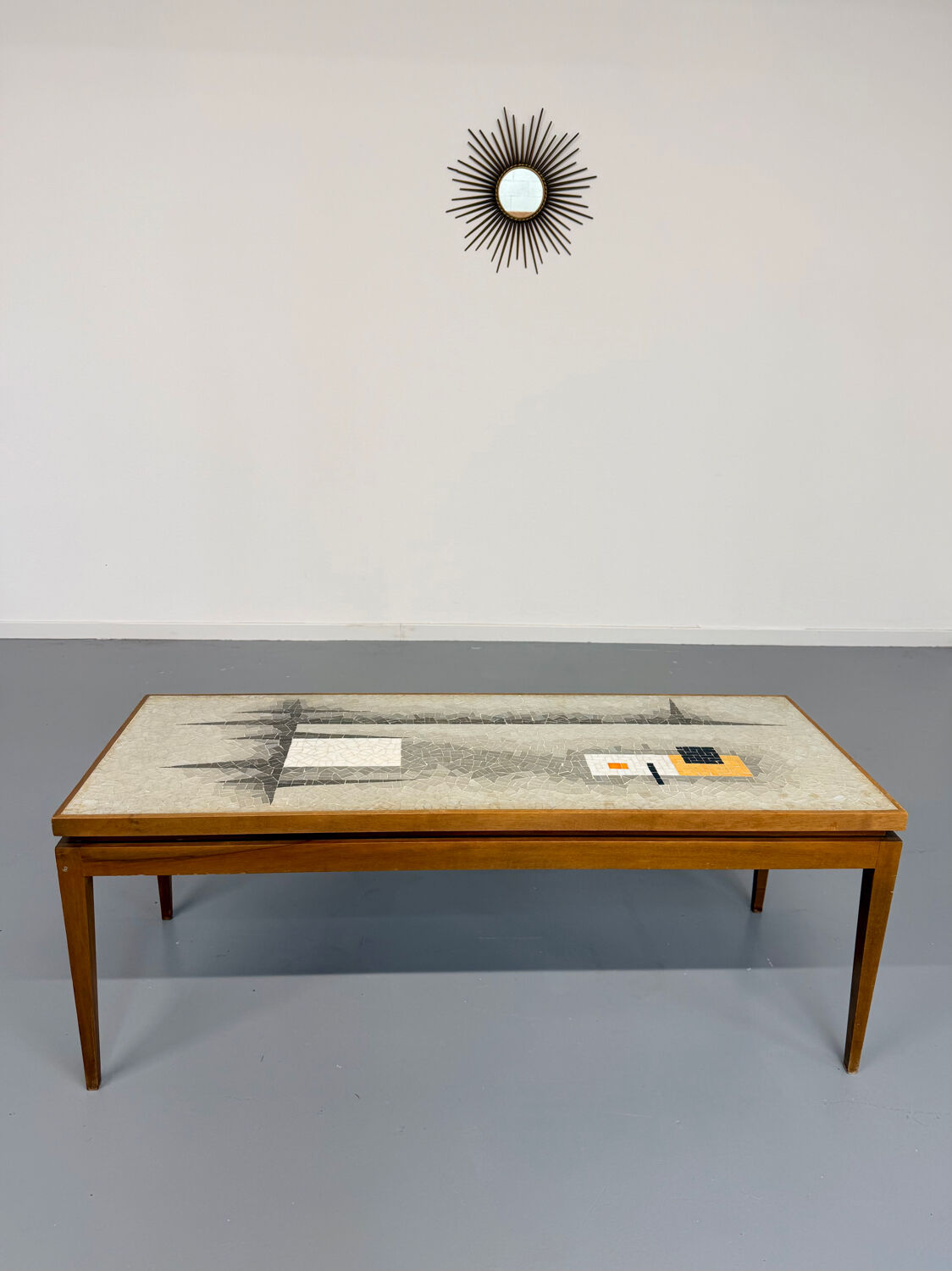 Vintage coffee table with mosaic top, 1960s modernist graphic design.