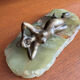 Art Deco female sculpture in bronze with onyx base.