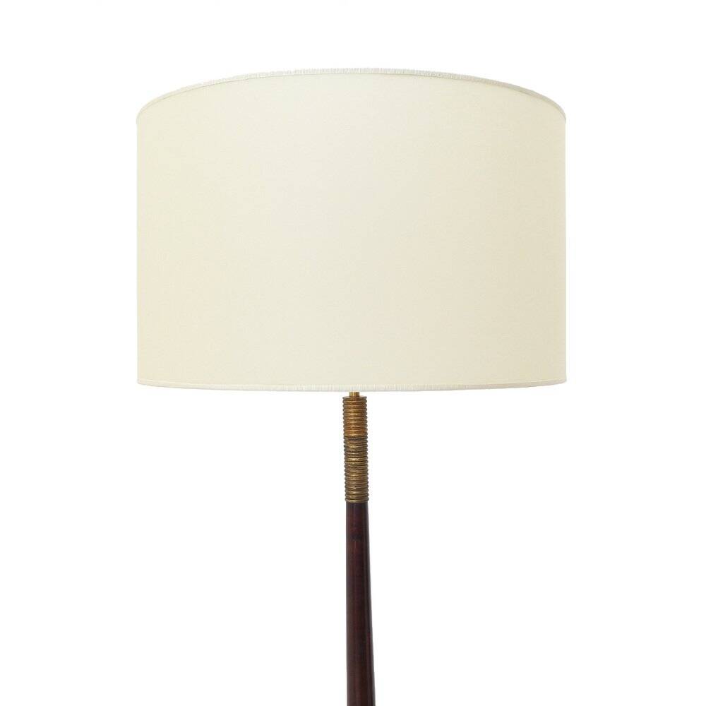 Floor lamp with a brass base and parchment shade, 1940s.