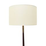 Floor lamp with a brass base and parchment shade, 1940s.