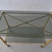 Serving style 1940 on gilded bronze smoked glass top