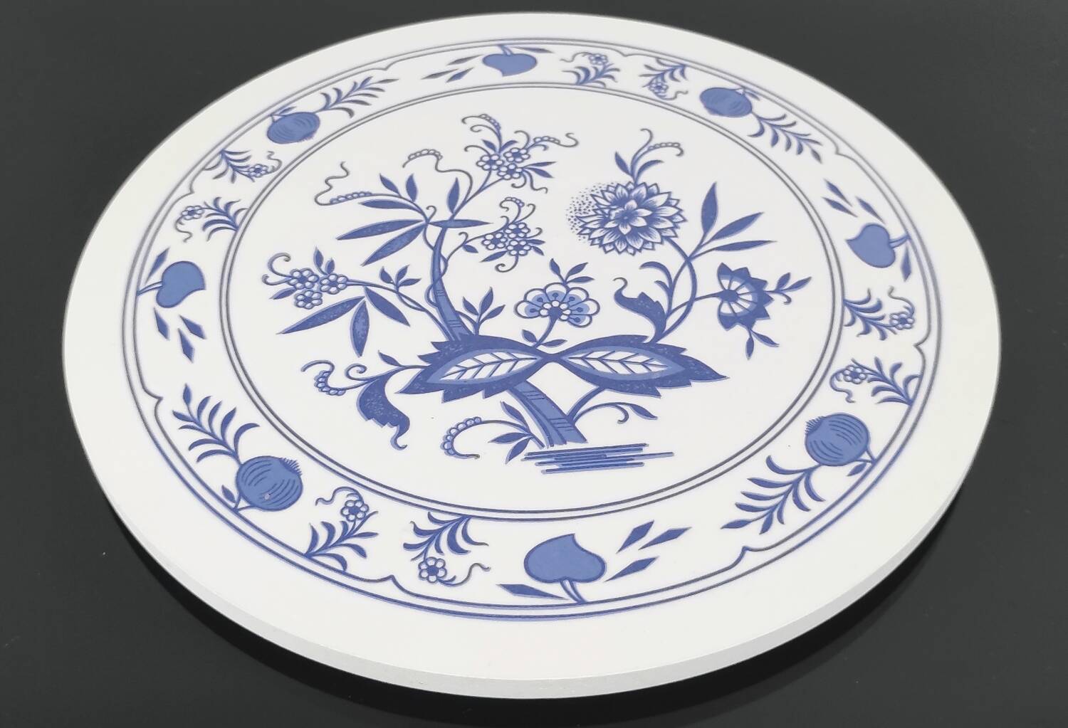 Vintage round trivet with blue floral pattern - 1970s