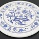 Vintage round trivet with blue floral pattern - 1970s