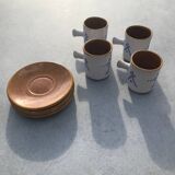 4 ceramic cups and saucers
