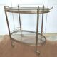 Desserte golden bar brass and glass