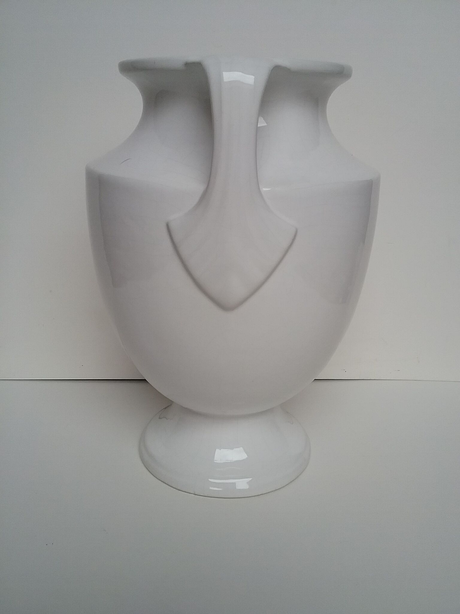 Cracked white ceramic vase