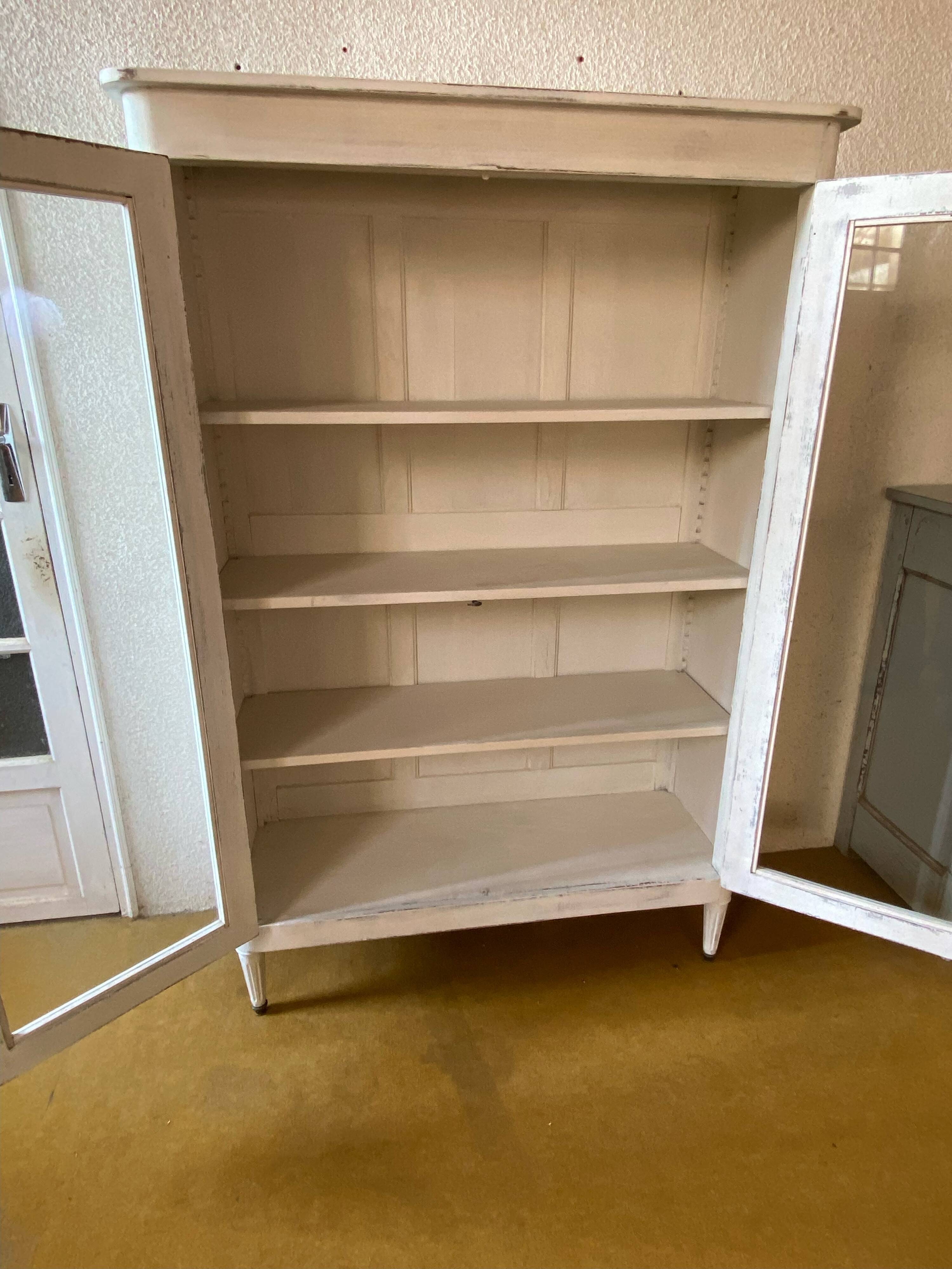 Painted glass bookcase, early 20th century