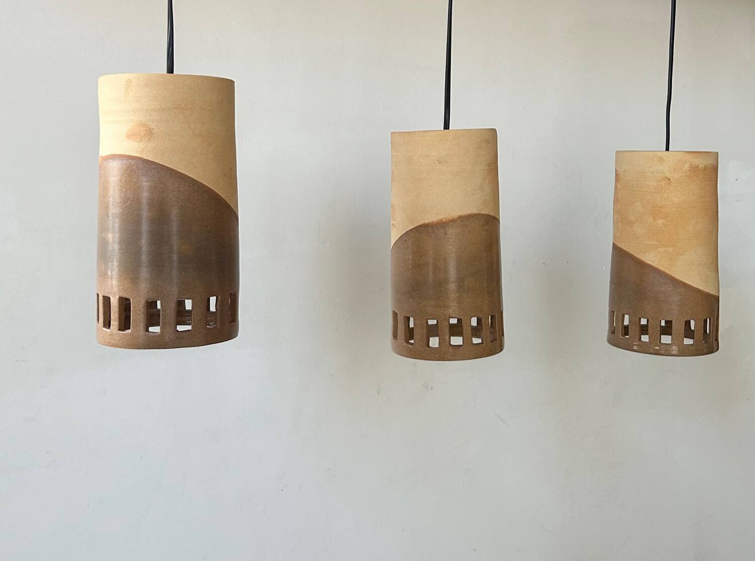 Set of 3 terracotta and enamelled suspensions, France