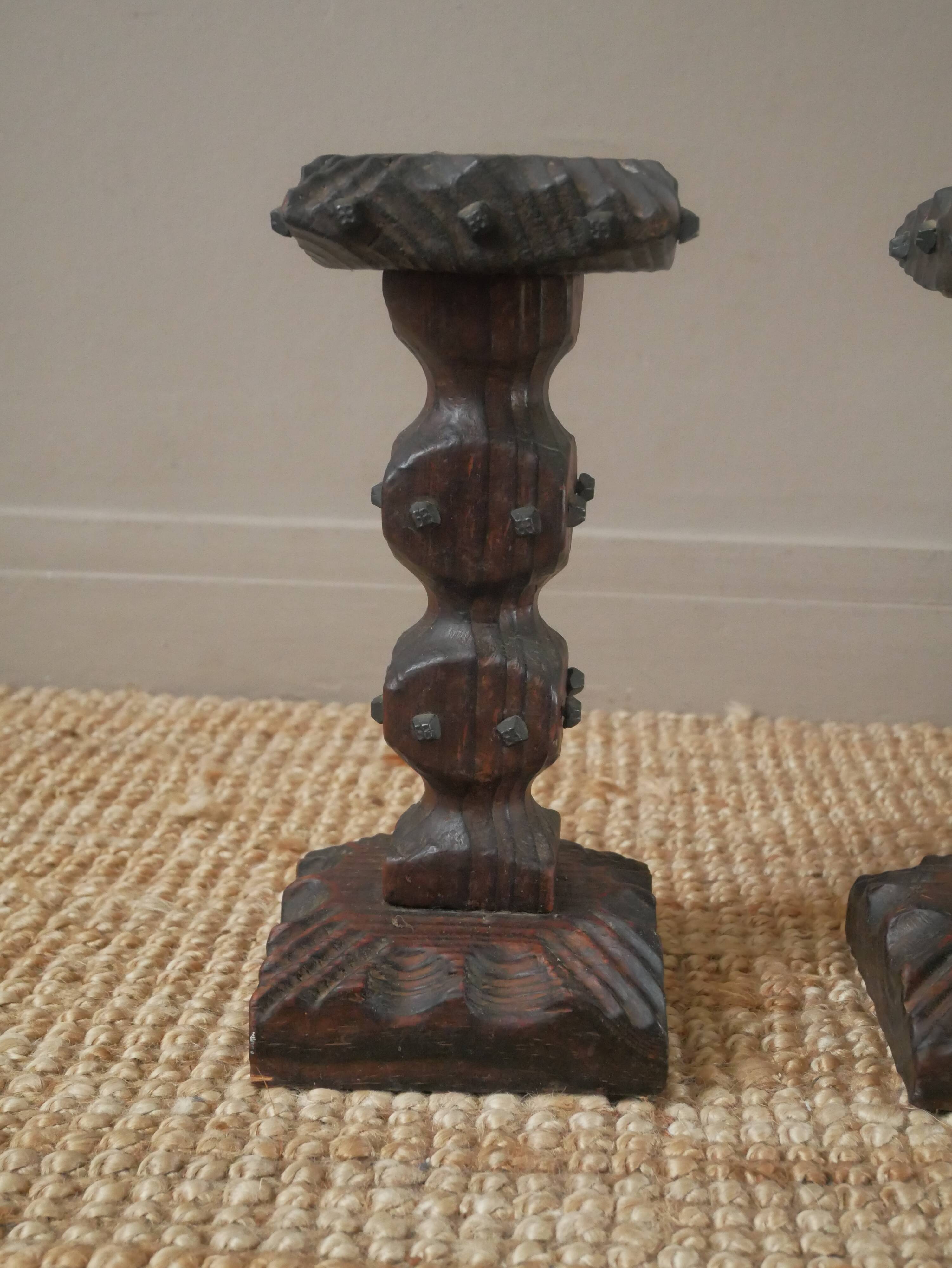 Pair of carved wood candlesticks iron nails handcrafted brutalist design candlesticks