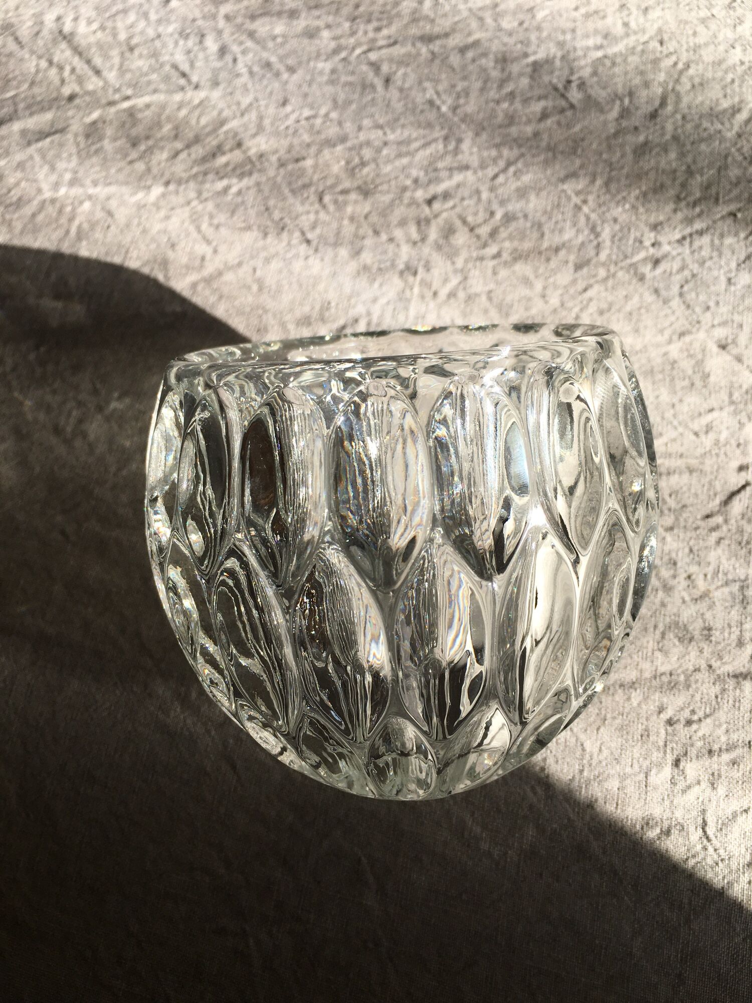 Duo of chiseled glass photophores